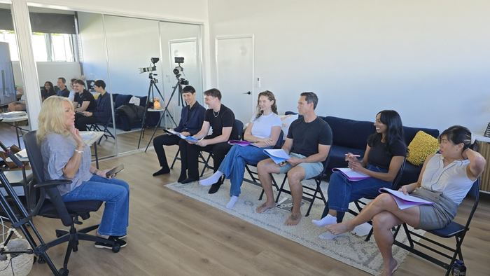 Sandra Bell working through a scene with the group